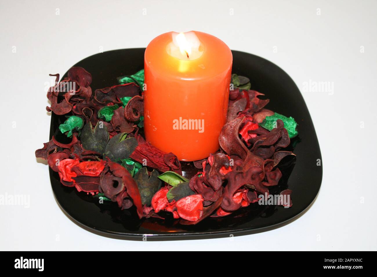 Still life of potpourri and candle Stock Photo Alamy