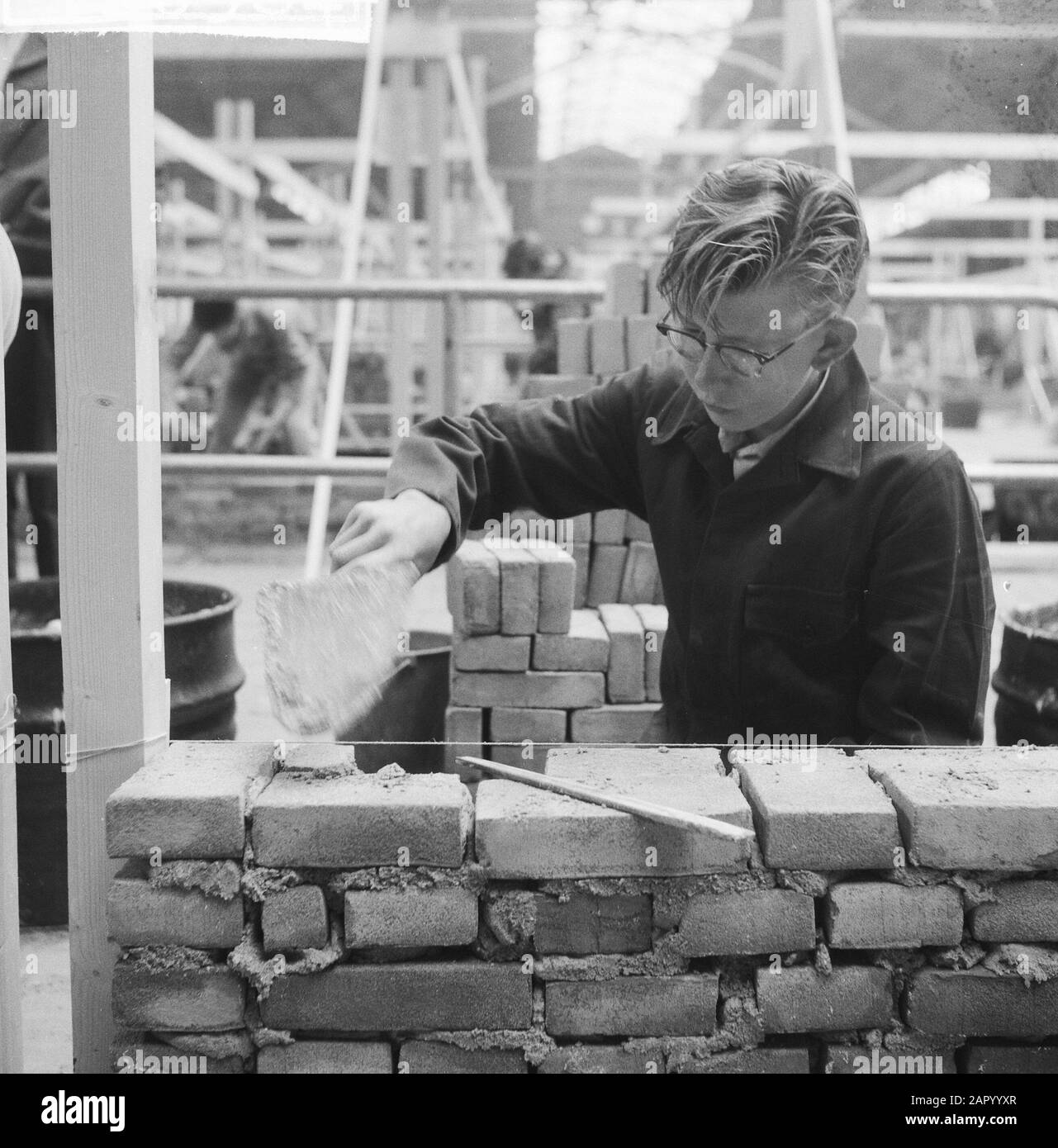 Masonry contest at the Ahoy Hall Date: July 3, 1961 Keywords: bricklaying Institution name: Ahoy Stock Photo