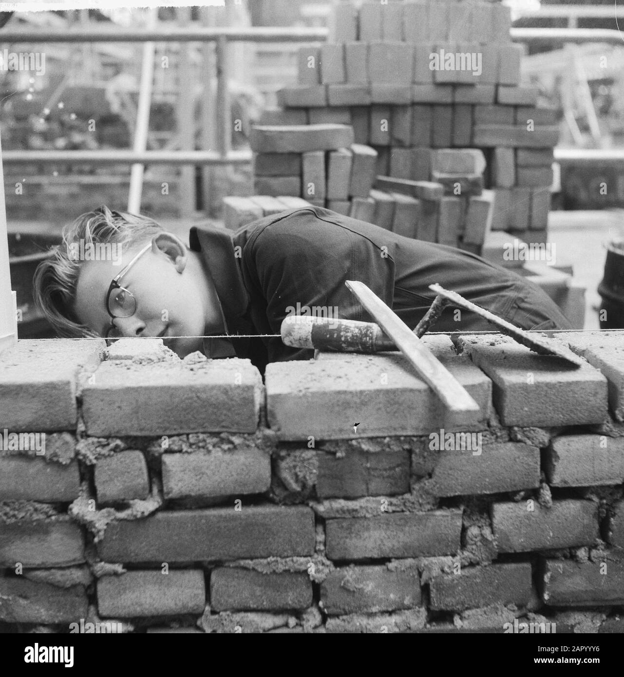 Masonry contest at the Ahoy Hall Date: July 3, 1961 Keywords: bricklaying Institution name: Ahoy Stock Photo