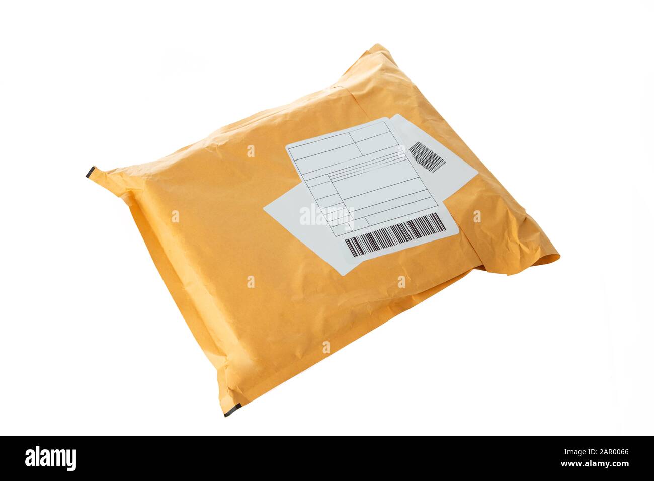 Small paper post packet isolated on the white background Stock Photo