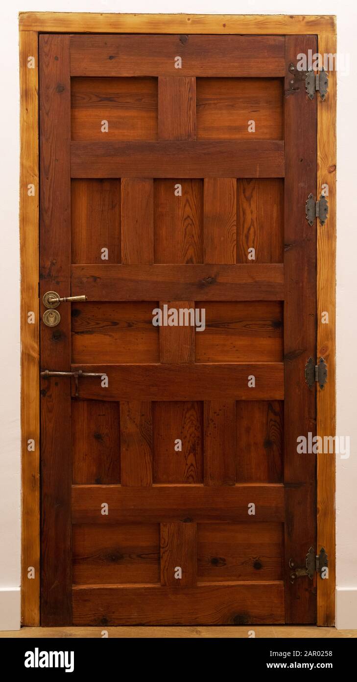 Spanish medieval farmhouse wooden door with panels and hinges Stock Photo Alamy