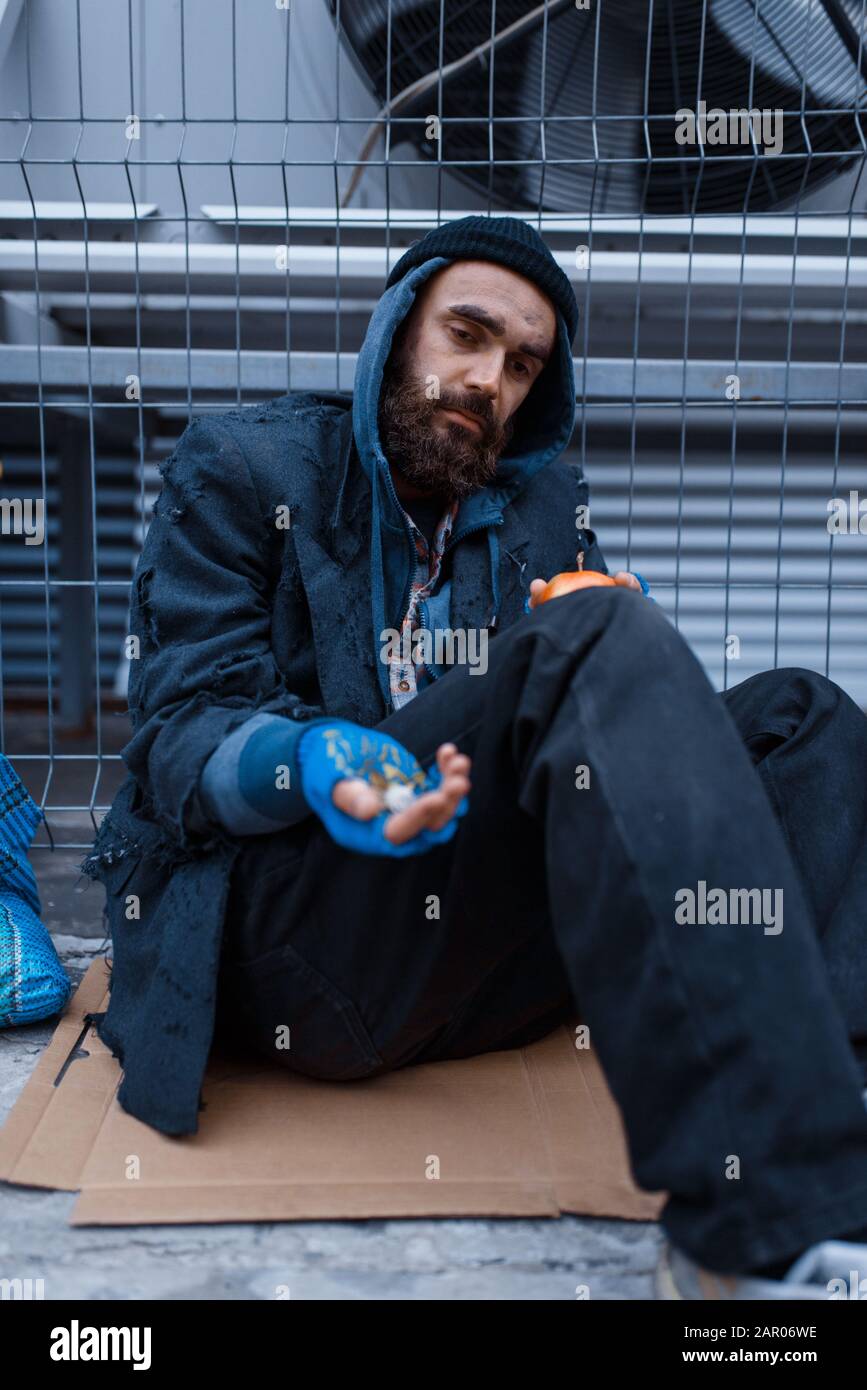 Begging on the street hi-res stock photography and images - Alamy