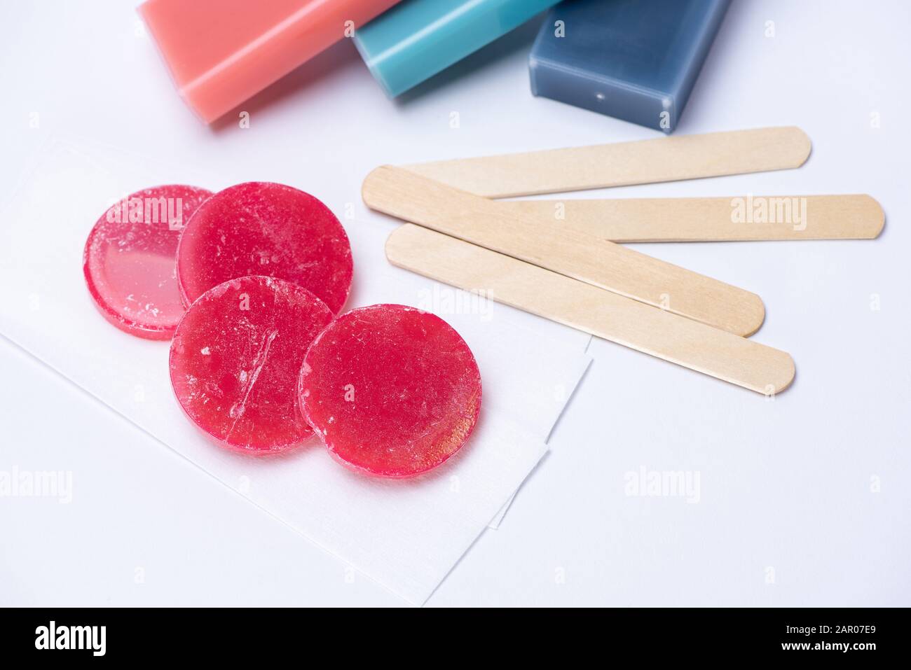 Red wax for depilation in tablets and cassettes, wooden sticks and