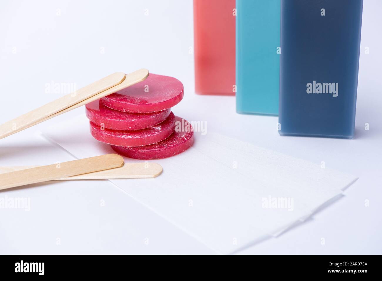 Red wax for depilation in tablets and cassettes, wooden sticks and