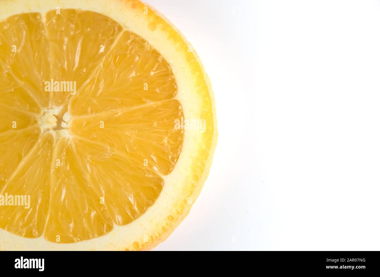 Slice of fresh orange isolated on white background Stock Photo - Alamy