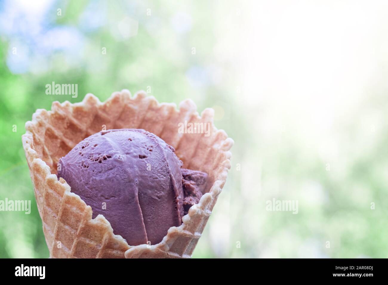 Chocolate ice cream in a waffle cone Stock Photo - Alamy