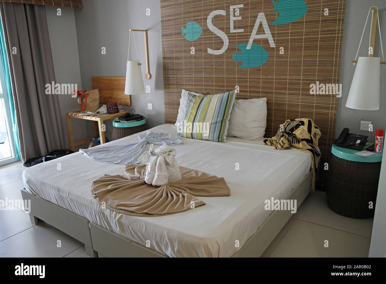 Interior hotel bedroom and bedding with furniture, Veranda Palmar Beach Hotel and Spa, Mauritius