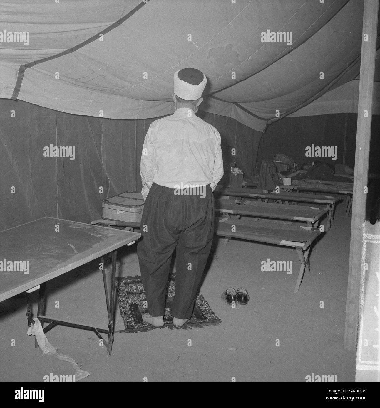 Jamboree 1963 at Marathon Greece. Greek Muslim praying in his tent. Spiritual caregiver Mohammedaan group Date: 12 August 1963 Location: Greece Keywords: tents, caregivers Institution name: Jamboree Stock Photo