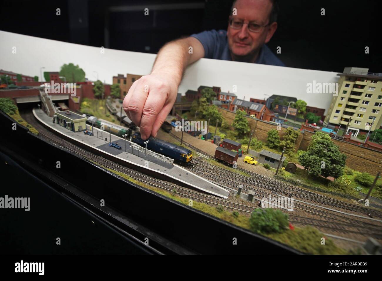 Stephen Farmer with his model representation of a Staffordshire railway at the 51st annual Pontefract Model Railway Exhibition in Pontefract, West Yorkshire. Stock Photo