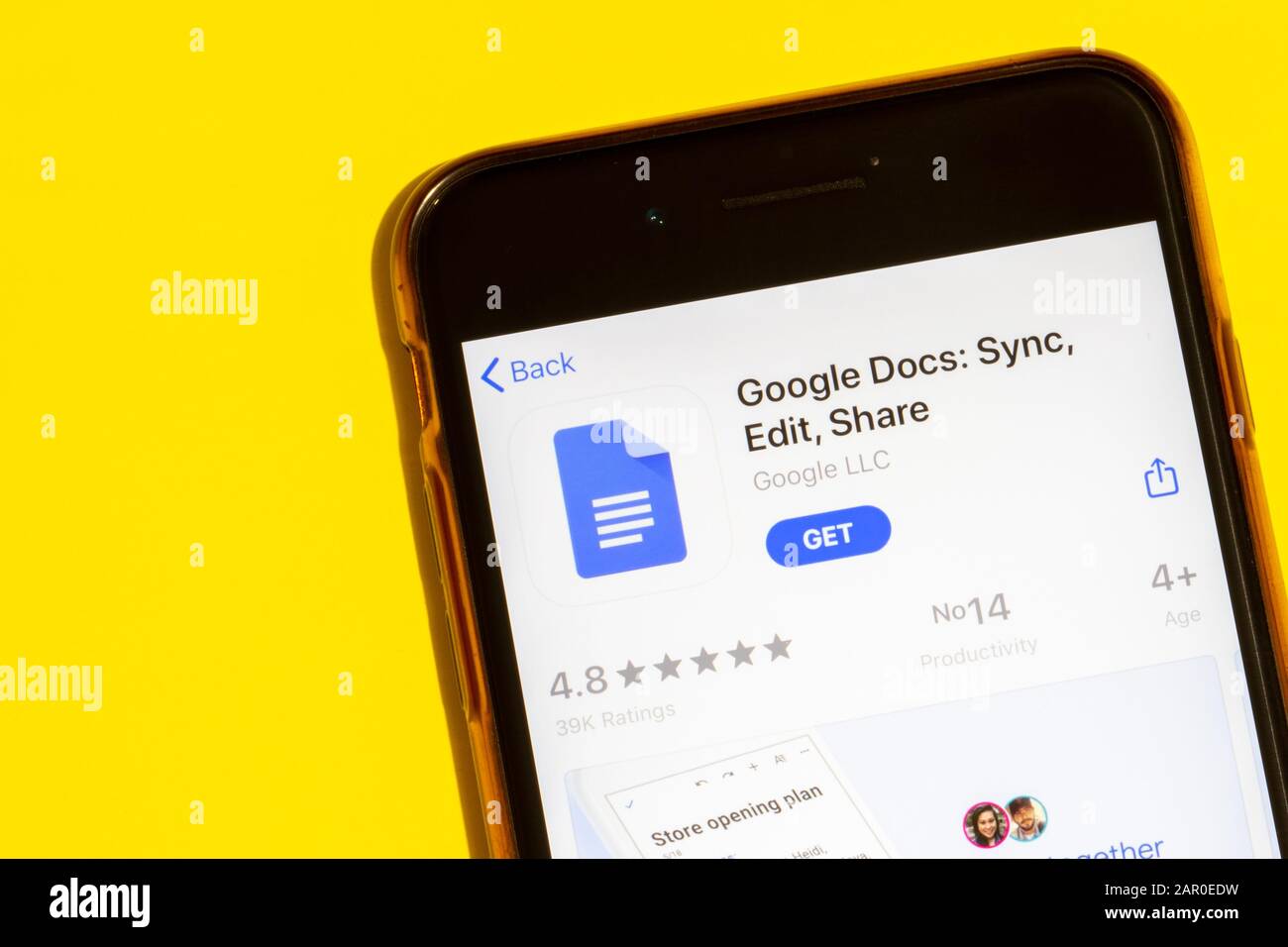 Los Angeles, California, USA - 22 January 2020: Google Docs logo on phone screen flat lay with yellow background, Illustrative Editorial Stock Photo