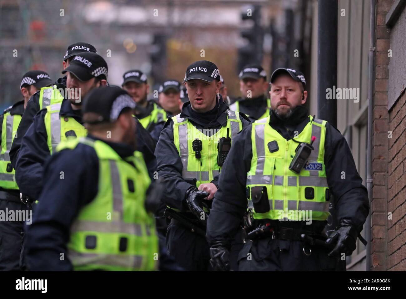 Police prepare for the West of Scotland Band Alliance March for Justice in Glasgow, which is set to be protested by a Loyalist group. Stock Photo