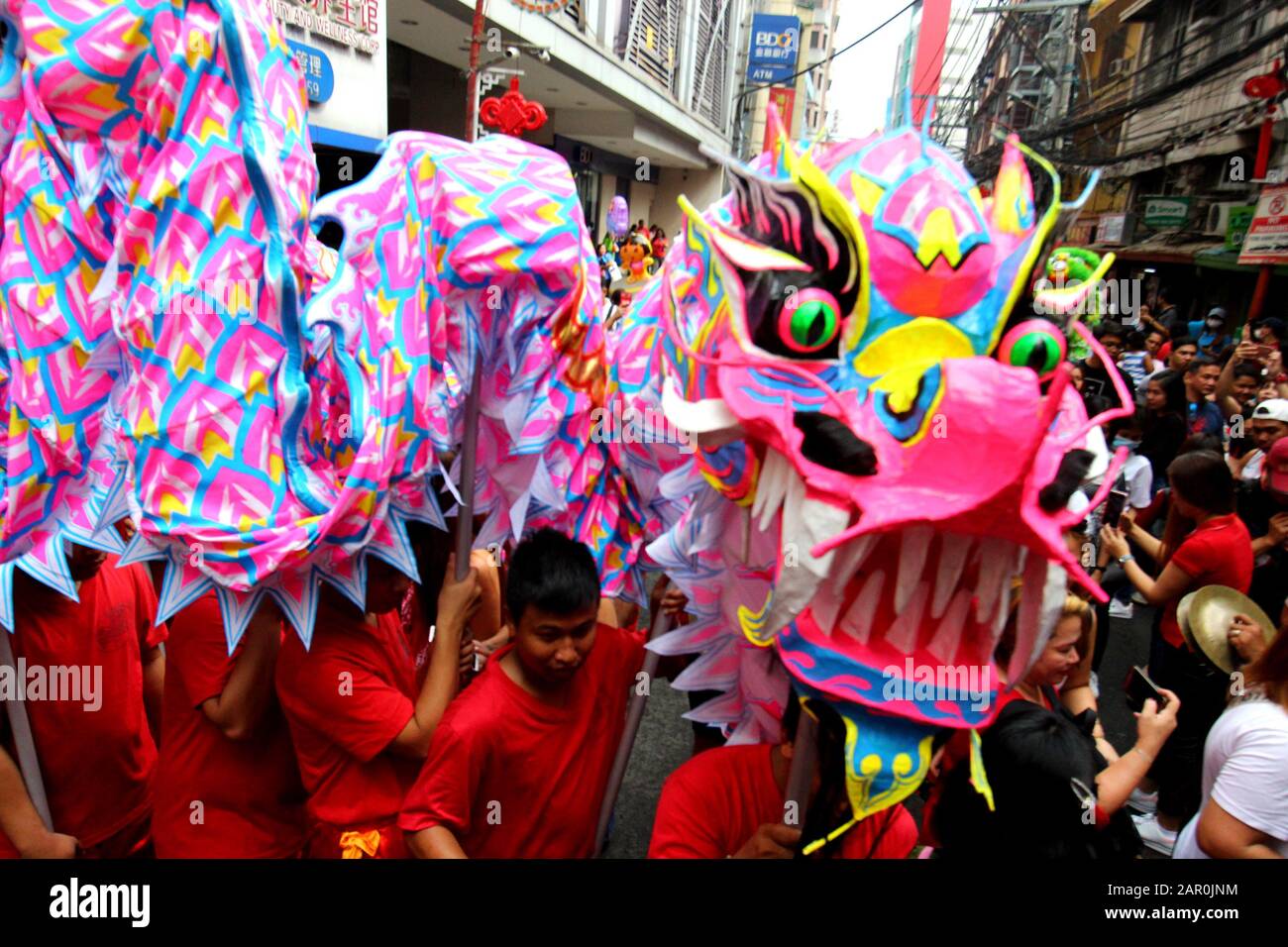 Binondo, Philippines. 25th Jan, 2020. A group of Dragon dancers performed their act in various streets of Binondo during the celebration of year of the rat Chinese New Year in Binondo (The oldest China Town in the world) Manila City on January 25, 2020. (Photo by Gregorio B. Dantes Jr./Pacific Press) Credit: Pacific Press Agency/Alamy Live News Stock Photo