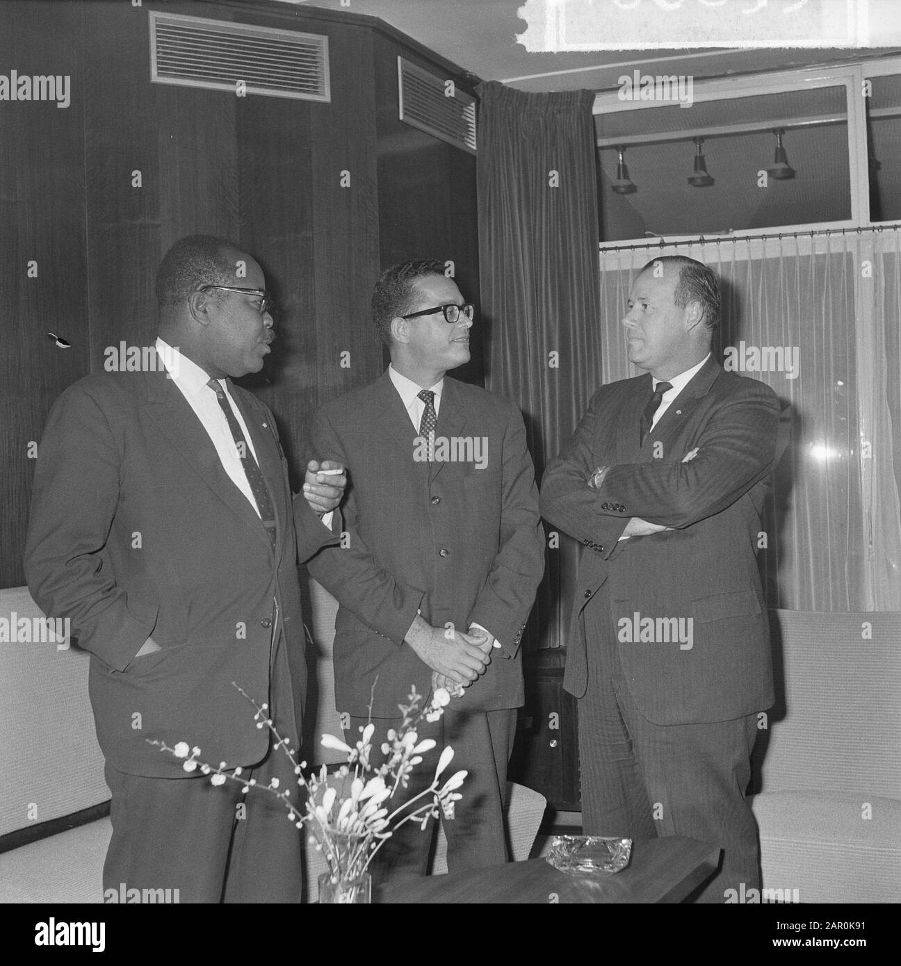 Leading persons of the Netherlands Antilles from Tel Aviv at Schiphol Airport, from l.n.r. Minister E. O. Petronia F. J. Tromp and I. S. Henriques Date: 25 February 1964 Location: Noord-Holland, Schiphol Personal name: F. J. Tromp, I. S. Henriques Stock Photo