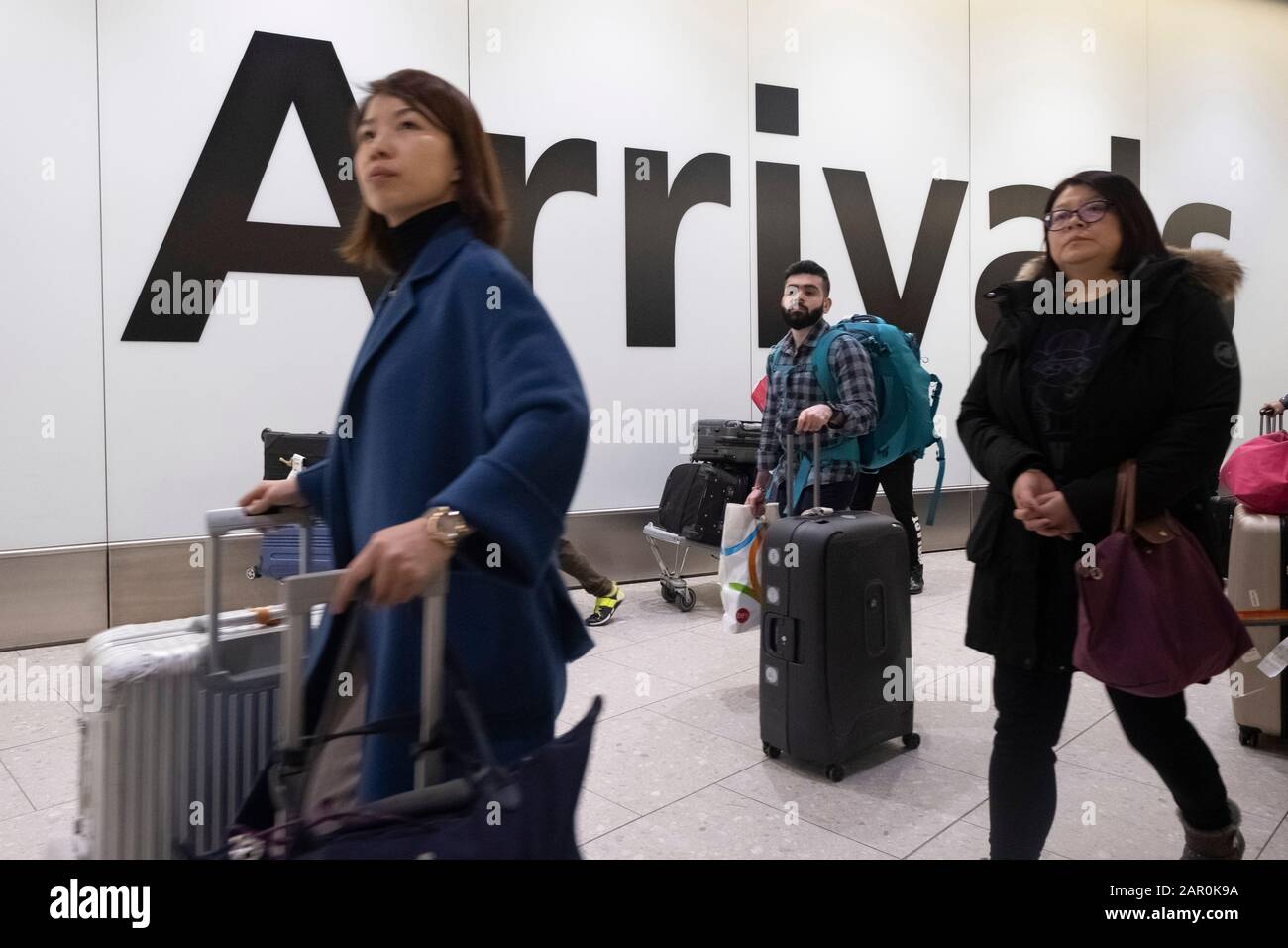 22 January 2020. London, United Kingdom. A Passengers arrives wearing