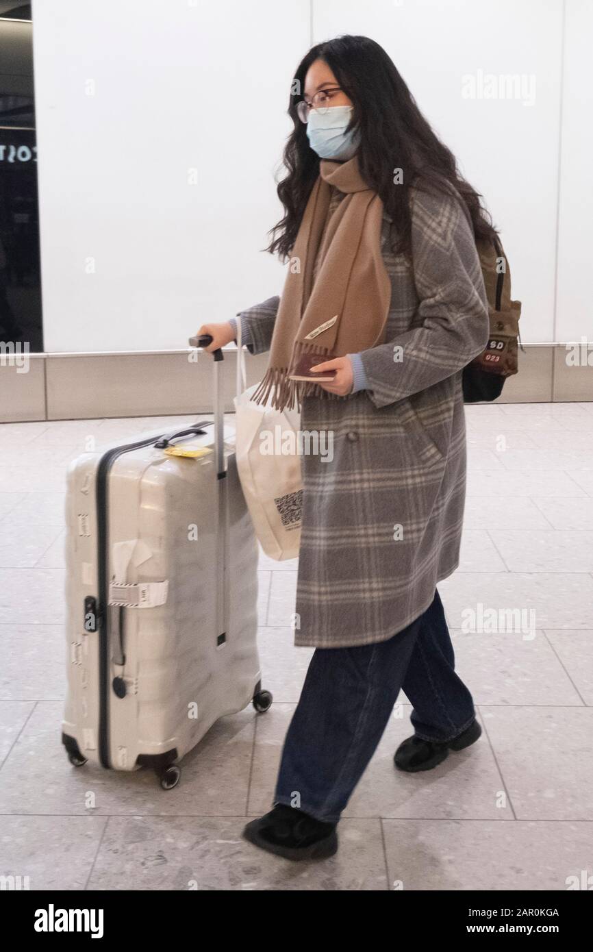 22 January 2020. London, United Kingdom. A passenger arrives wearing a
