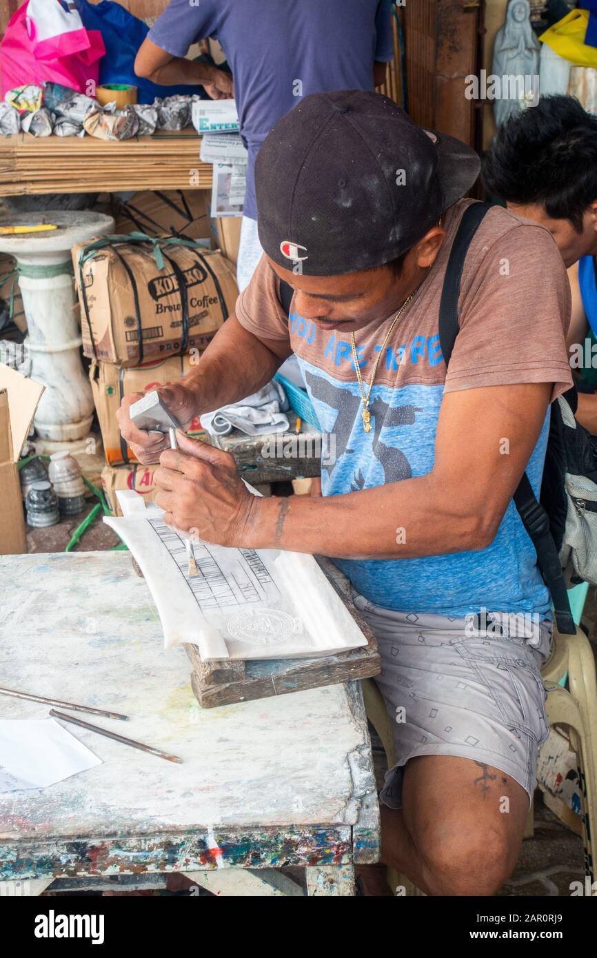 Romblon Island, Philippines - January 2020: Production workshop, factory for processing natural stone granite, marble into  finished goods warehouse. Stock Photo