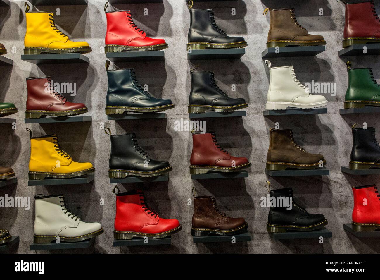 A display of colourful Dr Marten boots Stock Photo