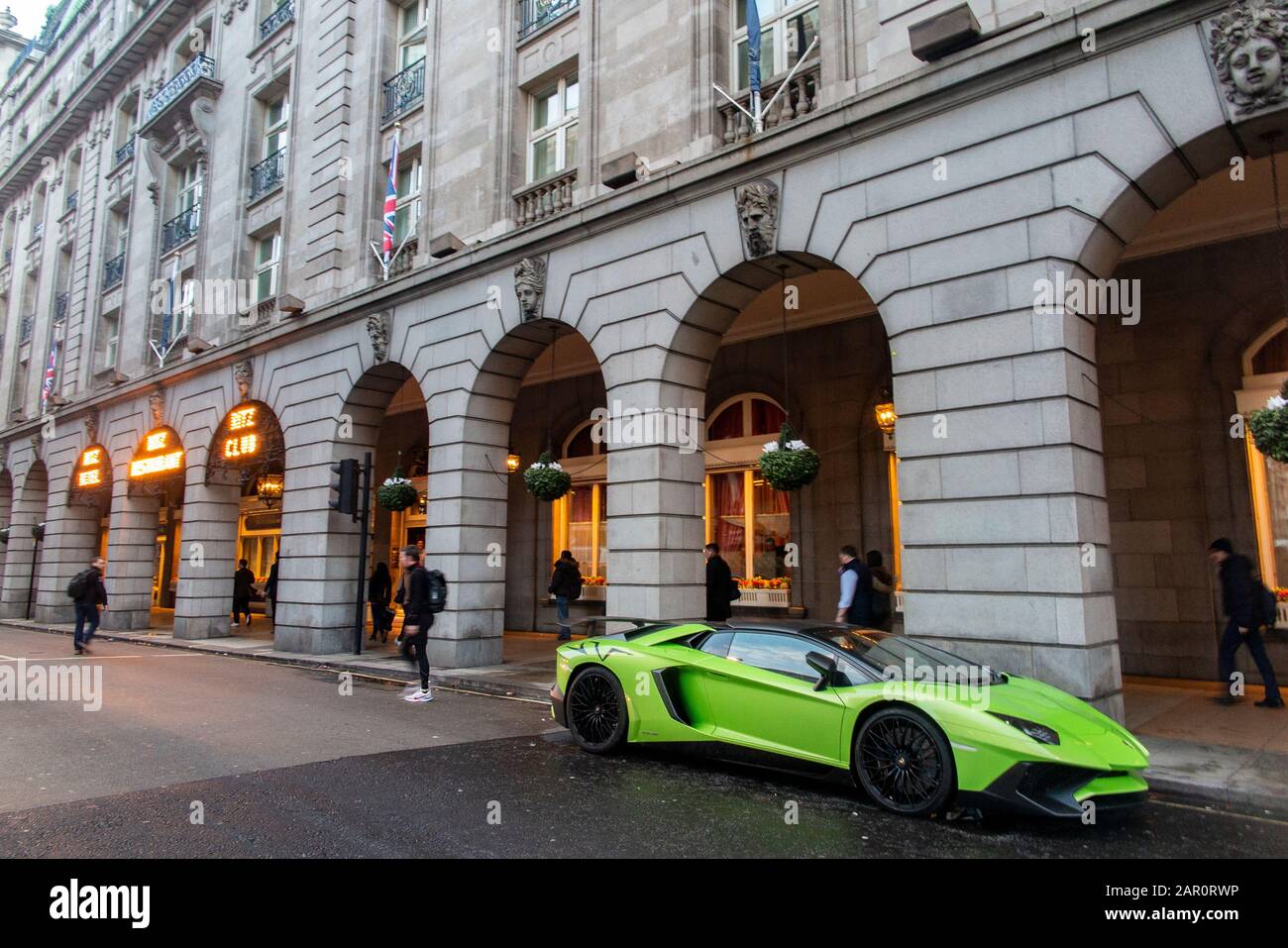 An illegally parked Lamborghini super car outside the famous Ritz Hotel on London's Piccadilly Stock Photo