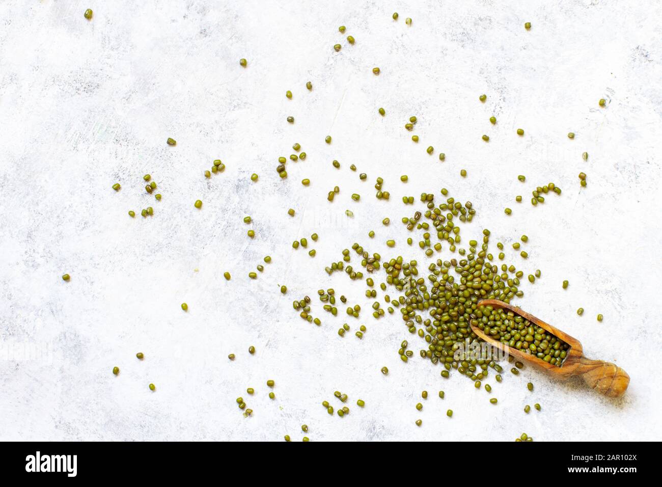 Dried mung beans with a spoon top view Stock Photo