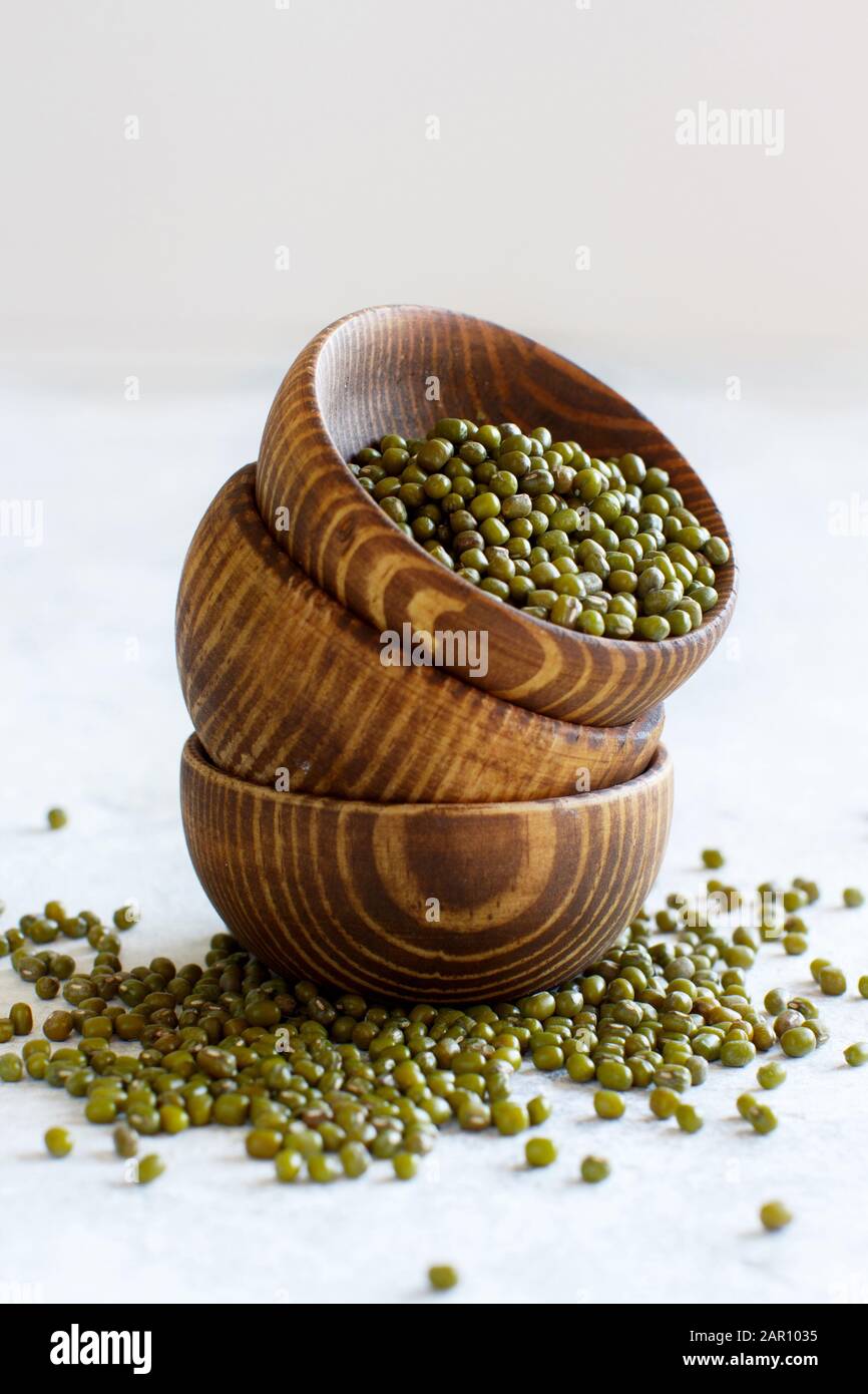 Dried mung beans in wooden bowls close up Stock Photo