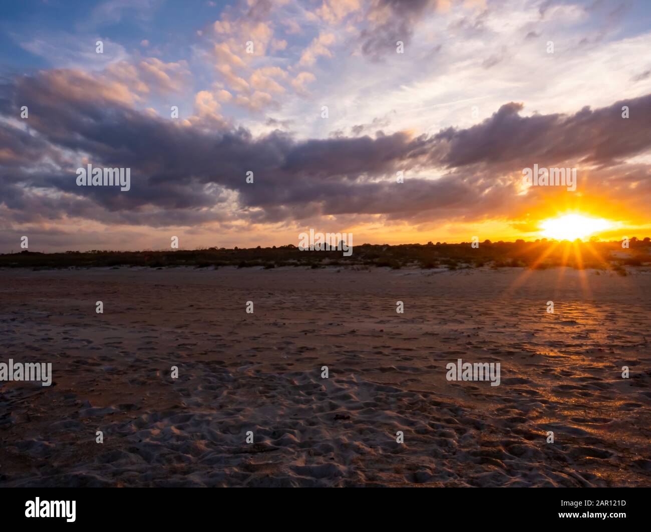 Colorful cloudy sunset beach hi-res stock photography and images - Alamy