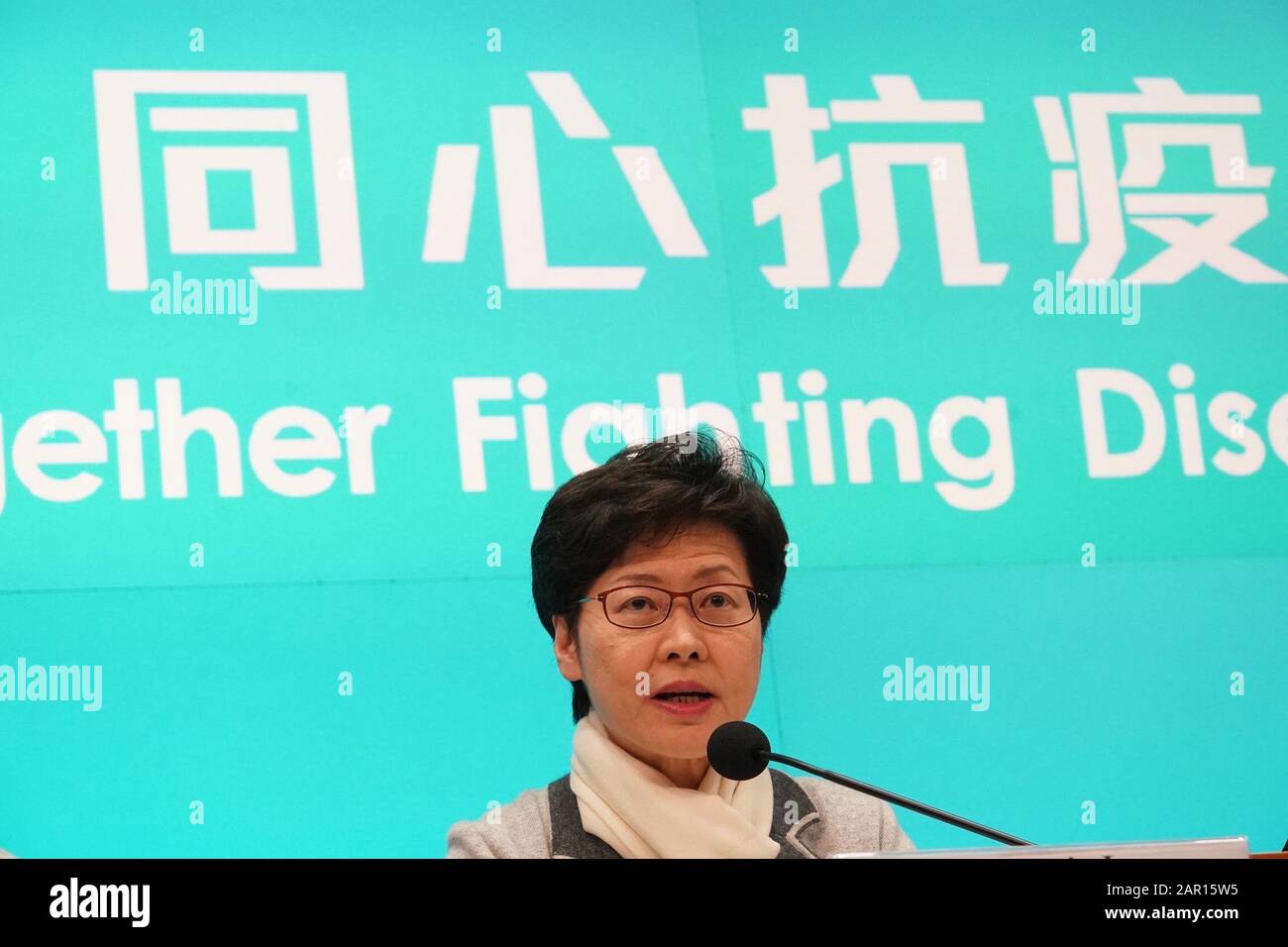 Hong Kong, China. 25th Jan 2020. Hong Kong, China. 25th Jan, 2020. Chief Executive of the Hong Kong Special Administrative Region (HKSAR) Carrie Lam speaks at a press conference in Hong Kong, south China, Jan. 25, 2020. Hong Kong on Saturday raised the government response to the new coronavirus pneumonia to the highest level with a series of measures from indefinitely suspending trains and flights to and from Wuhan to schools remaining closed for a longer period. Credit: Lui Siu Wai/Xinhua/Alamy Live News Stock Photo
