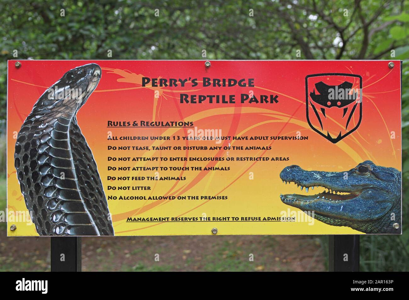 Perry's Bridge Reptile Park sign with rules and regulations and management reserves, Mpumalanga, South Africa. Stock Photo