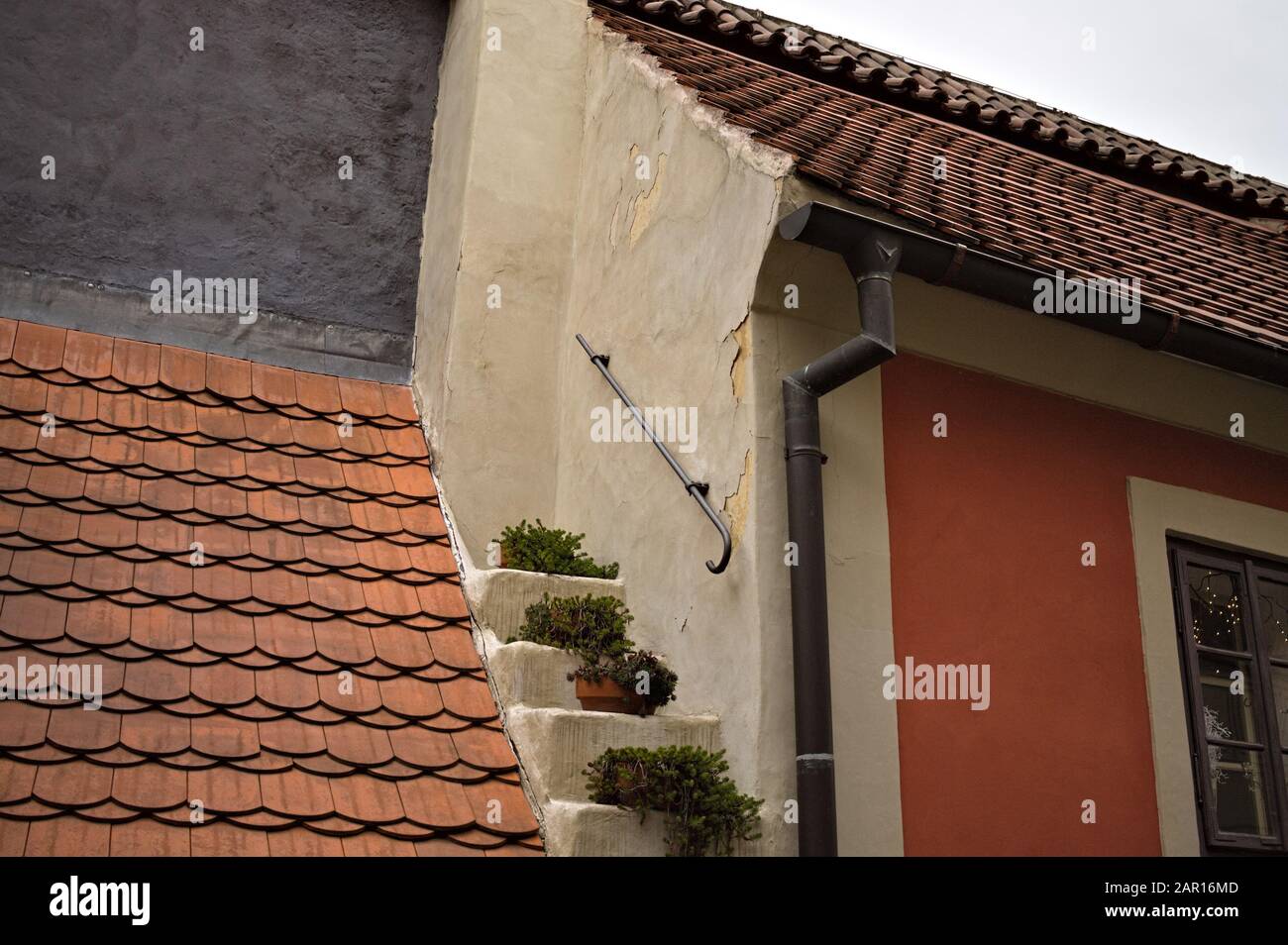 A detail of roofs with steps and plants (Prague, Czech Republic, Europe) Stock Photo