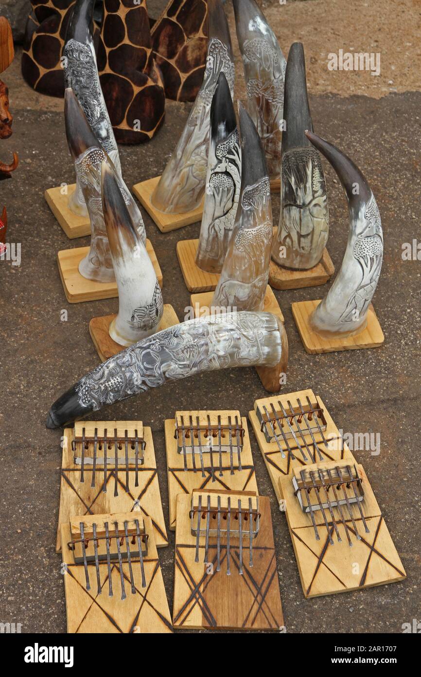 Six finger harps and ten rhino horns for sale at Blyde River Canyon, Mpumalanga, South Africa