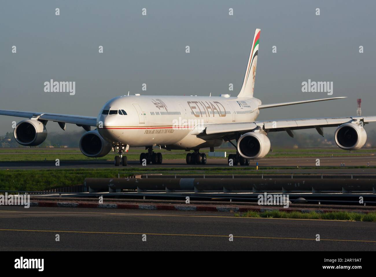 Paris / France - April 24, 2015: Etihad Airways Airbus A340-600 A6-EHK passenger plane arrival and landing at Paris Charles de Gaulle Airport Stock Photo