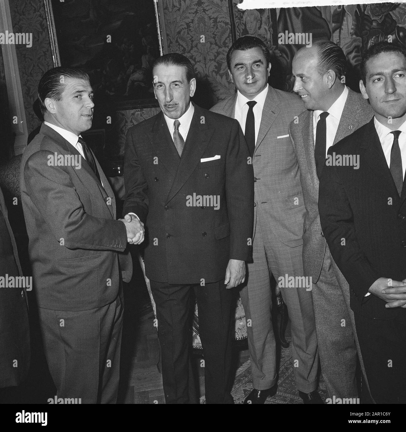 Real Madrid at Spanish Embassy in The Hague, Puskas and Spanish Ambassador Date: September 6, 1965 Location: The Hague, Spain Keywords: embassies, ambassadors, sport, football Name: Puskas, Ferenc Institution name: Real Madrid Stock Photo