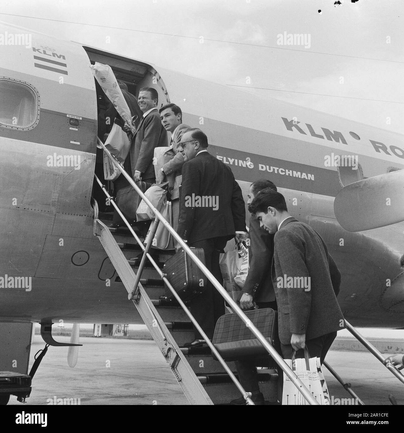Real Madrid departed from Schiphol, at the top of the stairs Puskas Date: 9 September 1965 Location: Noord-Holland, Schiphol Keywords: sport, departure, aircraft, football Personal name: Puskas , Ferenc Institution name: Real Madrid Stock Photo