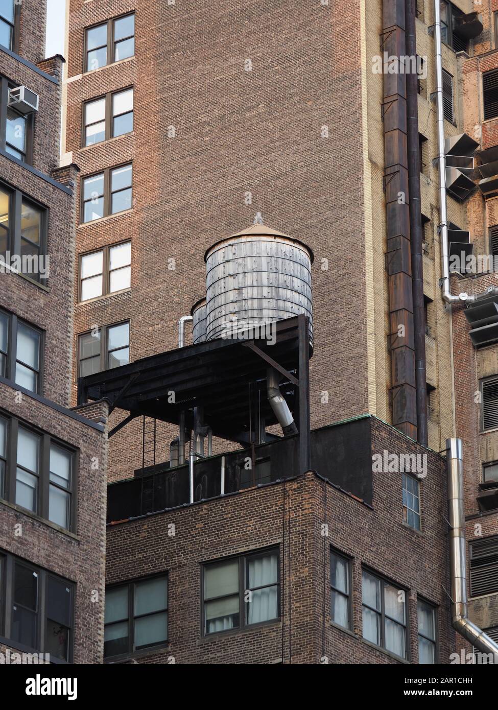 Rooftop water storage tower hi-res stock photography and images - Alamy