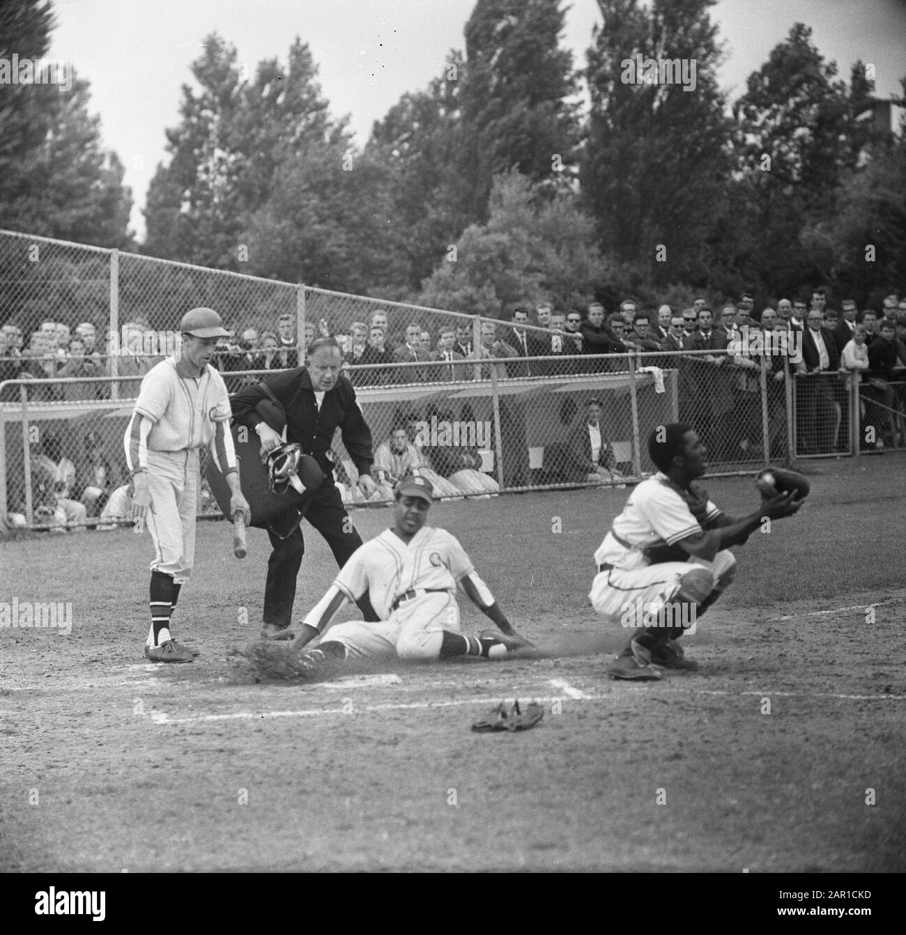 This throw beat Martin Maldonado to the plate, so he used a perfect swim  slide to avoid the tag