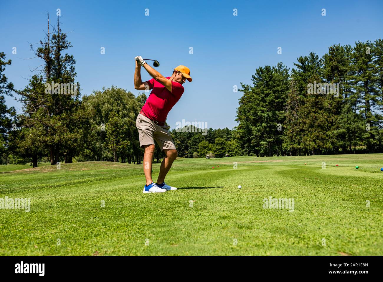 Hitting the perfect golf shot Stock Photo Alamy