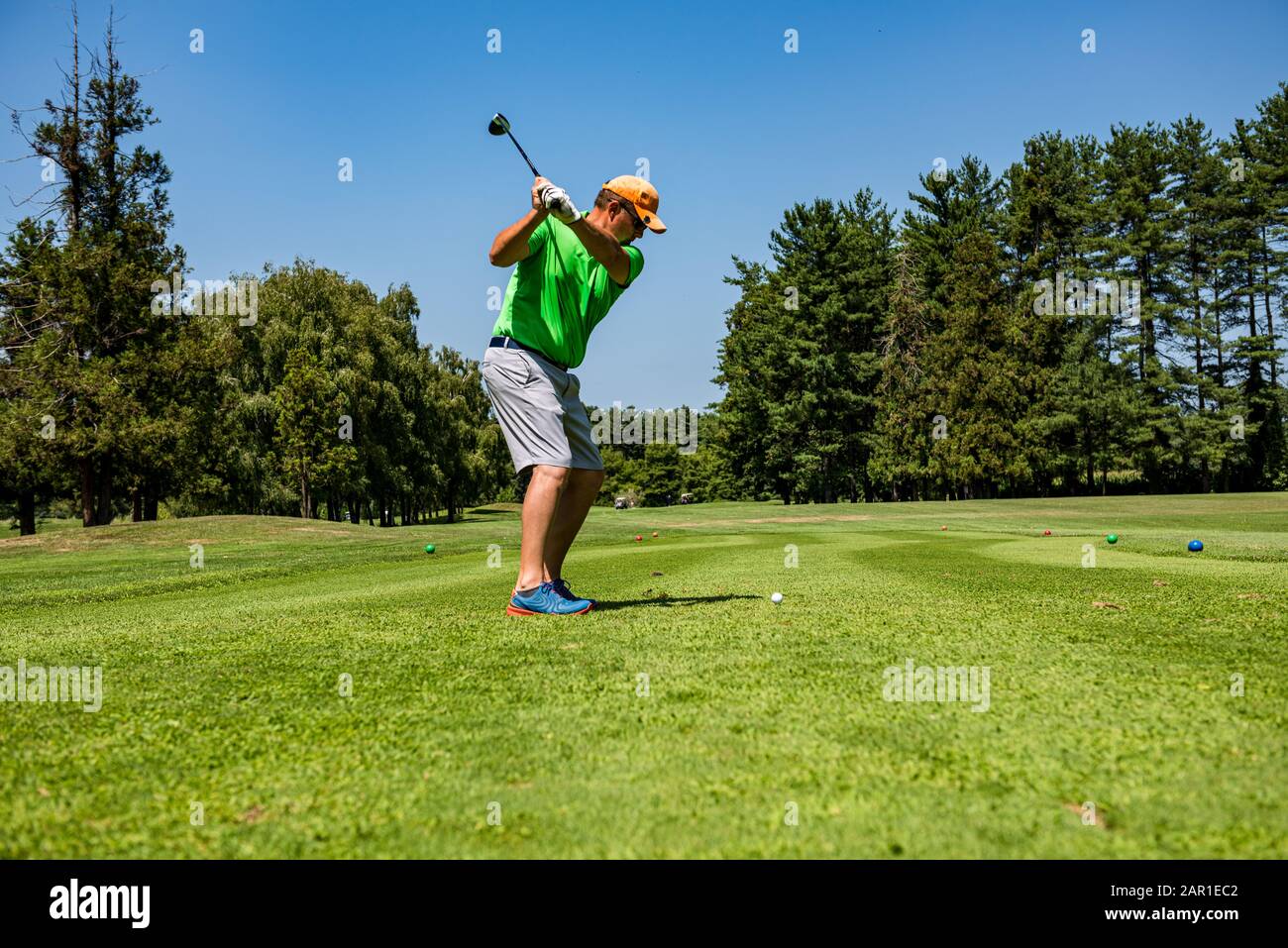Hitting the perfect golf shot Stock Photo Alamy