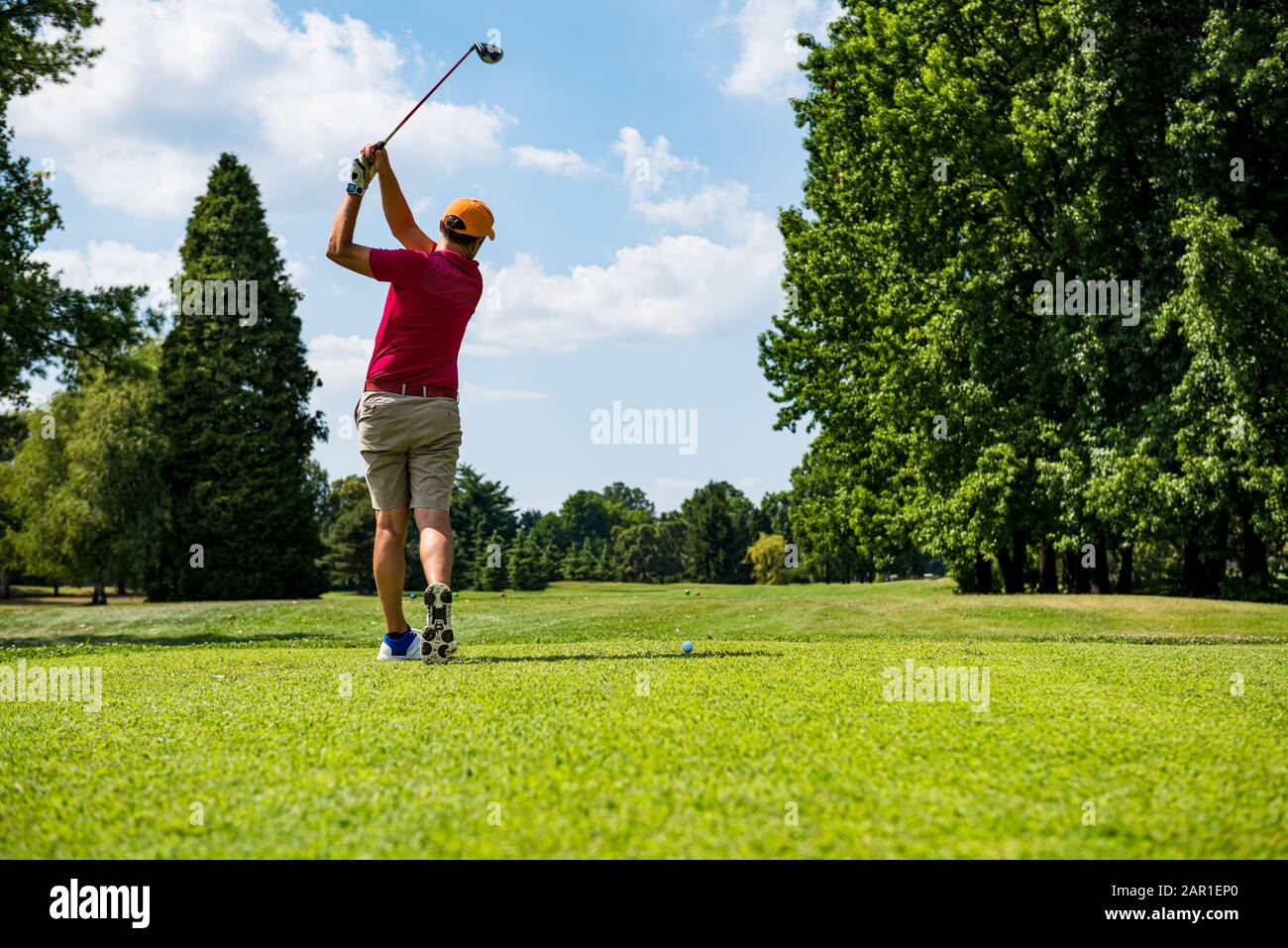 Hitting the perfect golf shot Stock Photo Alamy
