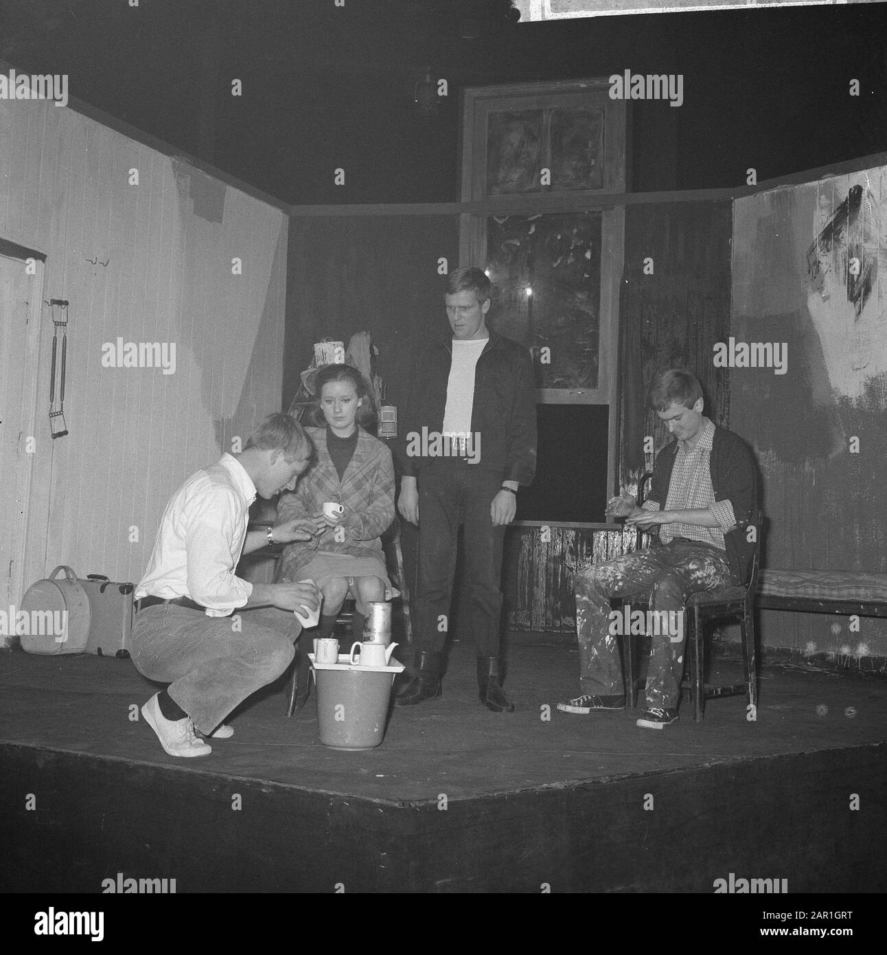 Explanation on theatre experience in relation to Youth and theatre by dramaturge Wilbert Bank in the Amsterdam theater De Brakke Grond  Painters on stage during the lecture of Wilbert Bank Date: 2 November 1965 Location: Amsterdam, Noord-Holland Keywords: painters, theatre Stock Photo