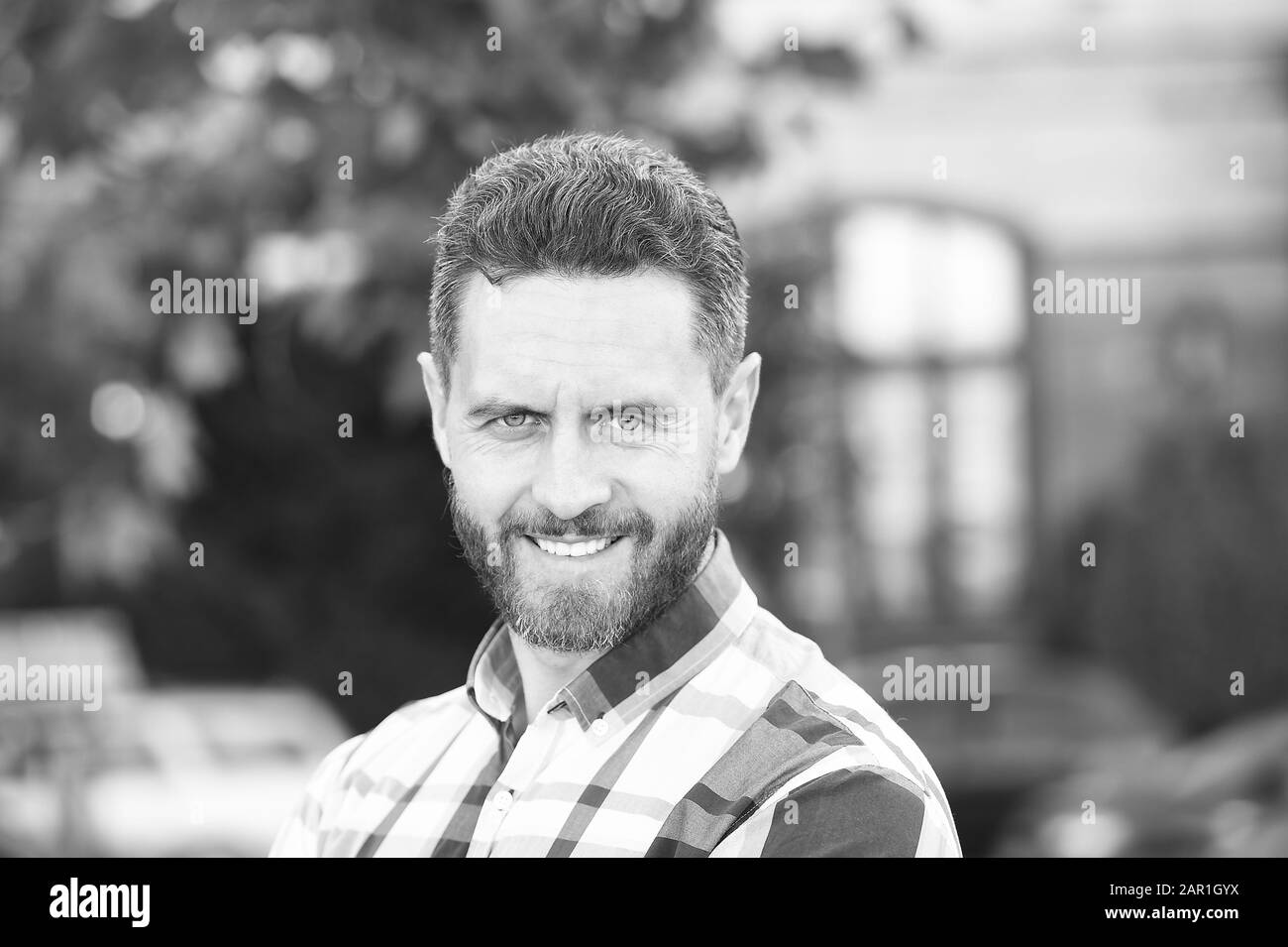 His Haircut Compliments His Barber Happy Guy On Urban Background