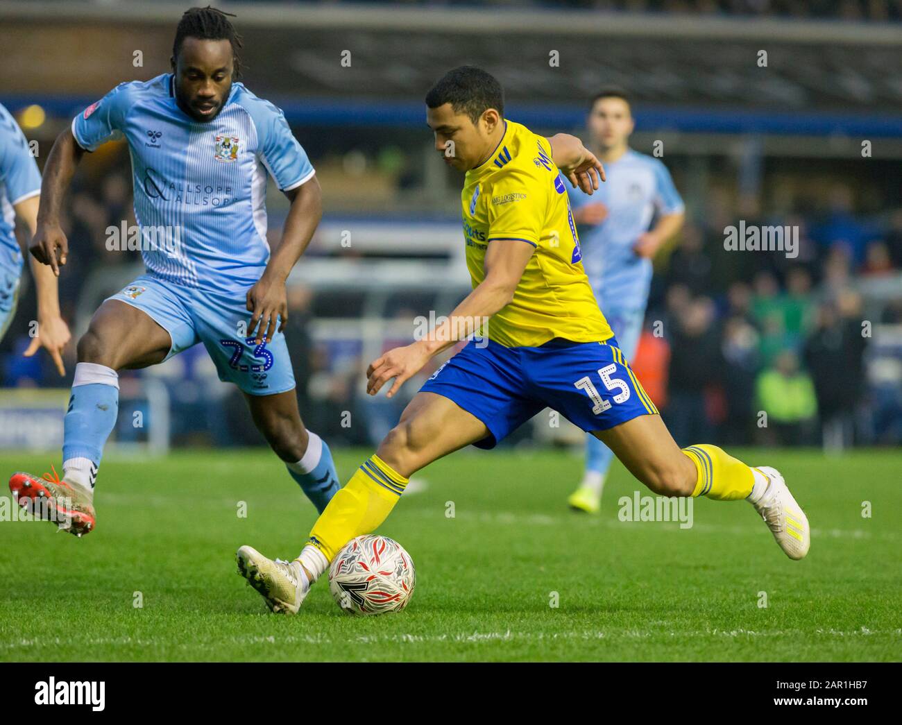 25th January 2020; St Andrews Stadium, Coventry, West Midlands, England; English FA Cup Football, Coventry City v Birmingham City; Jefferson Montero of Birmingham City stretches to cover the ball at his feet as Fankaty Dabo of Coventry City comes in to tackle - Strictly Editorial Use Only. No use with unauthorized audio, video, data, fixture lists, club/league logos or 'live' services. Online in-match use limited to 120 images, no video emulation. No use in betting, games or single club/league/player publications Stock Photo