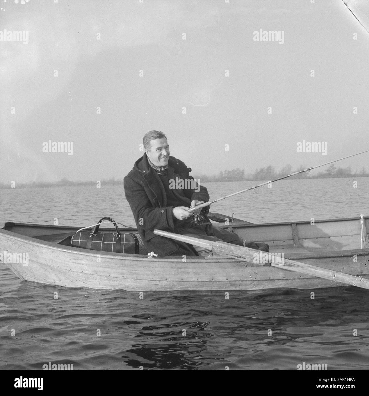 Small fishing boat setting Black and White Stock Photos & Images - Alamy