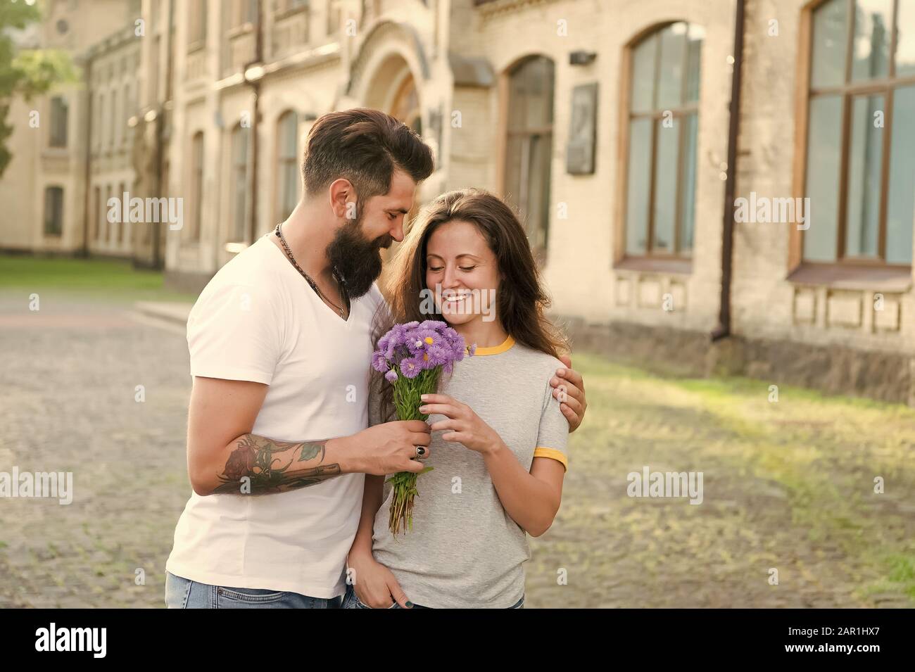 Expressing feelings. Woman enjoy fragrance bouquet flowers. Lady likes