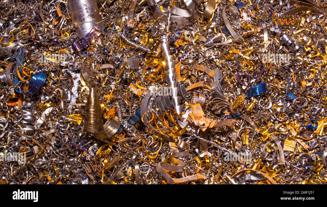 Abstract color background of metal shavings. Processing of ferrous and ...