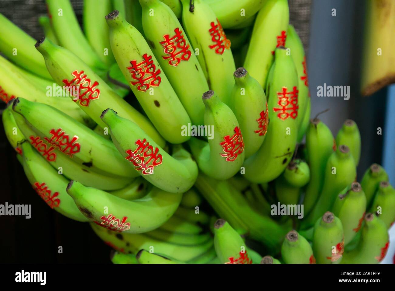 banana-fruits-with-red-chinese-character-stickers-meaning-double