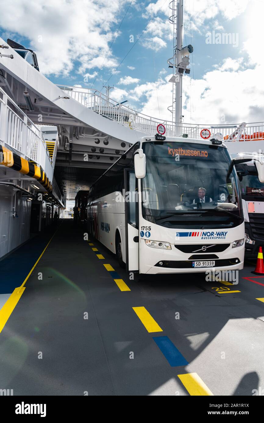 Editorial 09.03.2019 Halhjem Norway, Bus on the car deck of the car ferry between Halhjem to Sandvikvåg Stock Photo