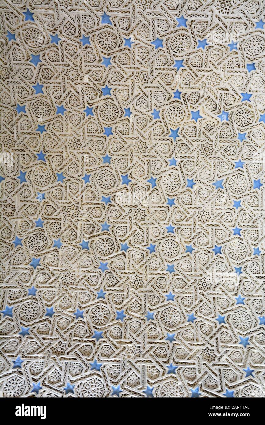 18th century Islamic geometrical home ceiling designs in sculpted plaster stucco known as Naqsh-hadida, in the Bardo Museum in Tunis, Tunisia. Stock Photo