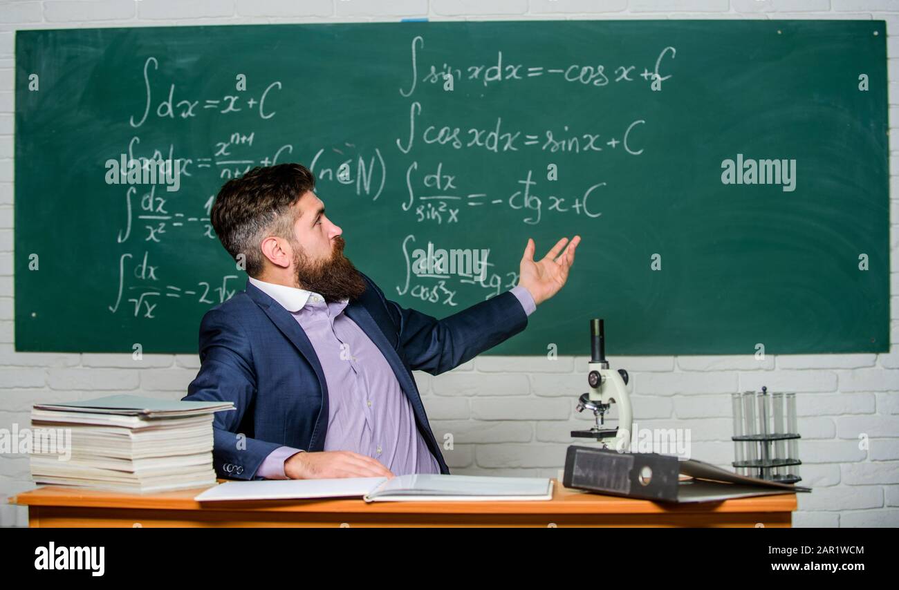 Teaching and education. University teacher use teaching aids. Bearded man teaching chemistry in