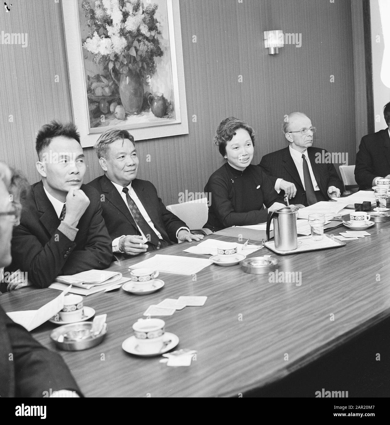 South Vietnamese minister during press conference in Amsterdam, Mr Huynh van Nghi, husband of Minister Dr. Tran Ngoc Dang Mrs Hoa Date: 1 May 1974 Location: Amsterdam, Noord-Holland Keywords: ministers, press conferences Stock Photo
