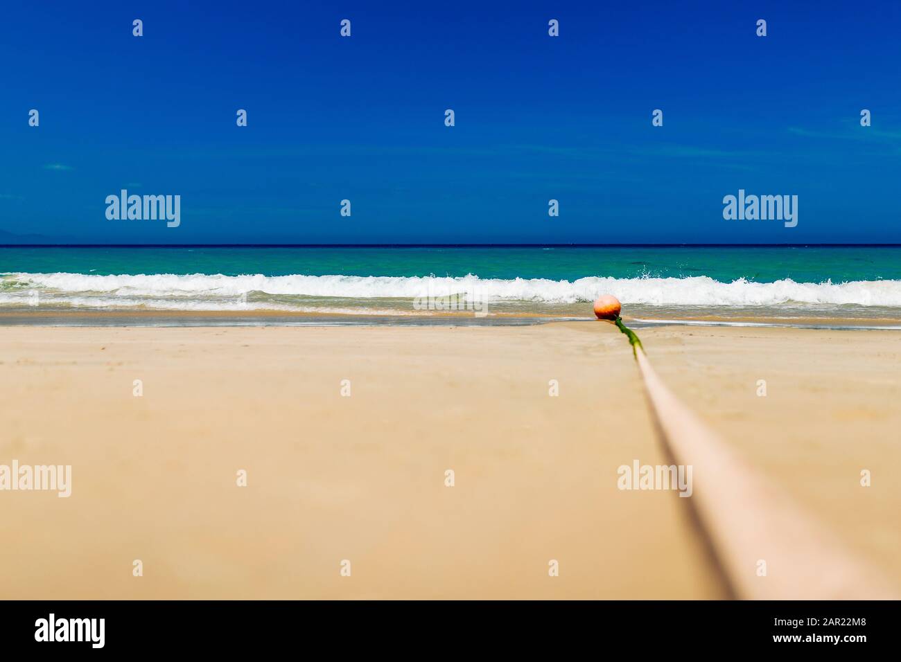 Empty sand beach with blue sea and blue sky background. Summer Vacation ...