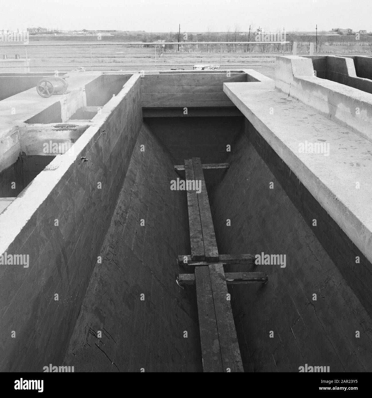cleaning wastewater, treatment of urban waste, sewage treatment plants, imhoff-tank Date: 1965 Location: Den Oever Keywords: cleaning wastewater, sewage treatment plants, processing urban waste person name: imhoff-tank Stock Photo